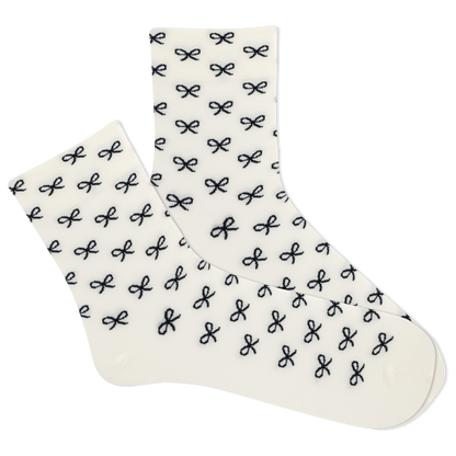 White socks with black bow pattern on a white background