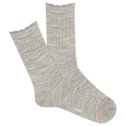 Pair of light gray socks with pink accents on a white background