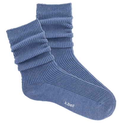 pair of demin blue slouch socks shown on a white background