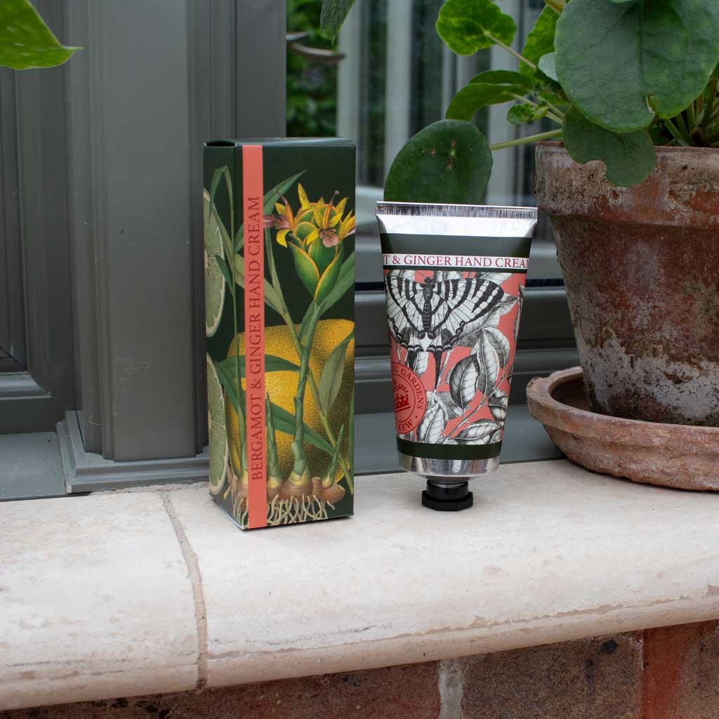 bergamot and ginger lotion tube and box in a decorated setting