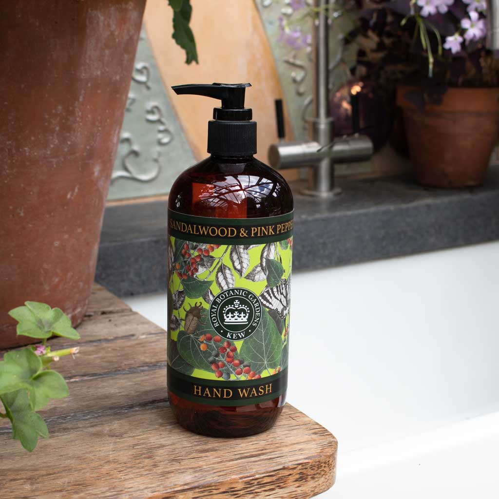 pump bottle of hand wash on a decorated surface