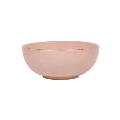 blush pink cereal bowl on a white background