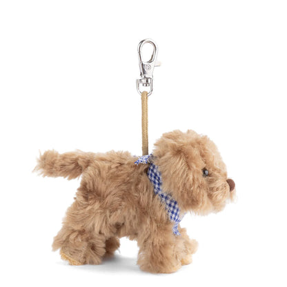 side view of kharma dog bag charm shown on a white background