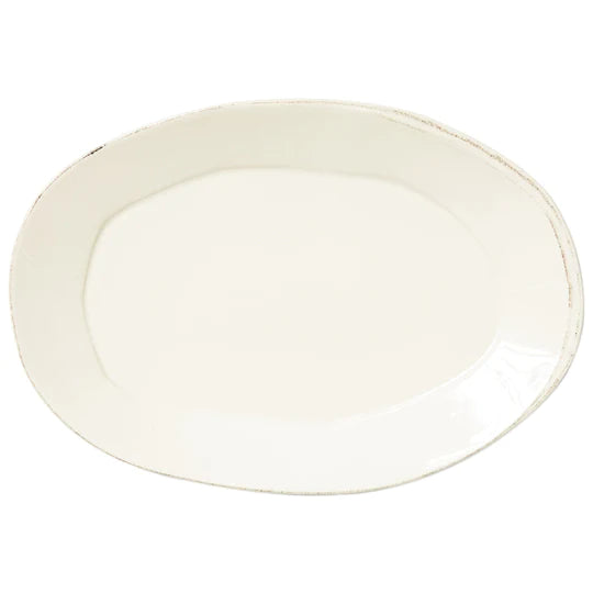 Vietri Lastra Linen colored oval platter on a white background