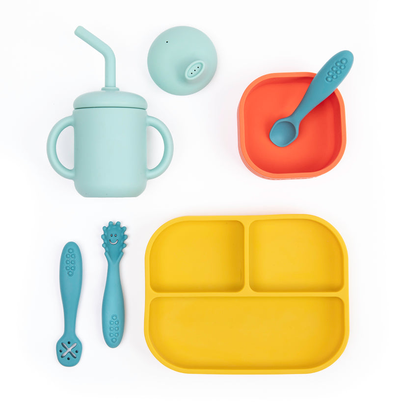 little bites set with yellow plate, orange bowl, light blue cup and lids, and blue utensils.