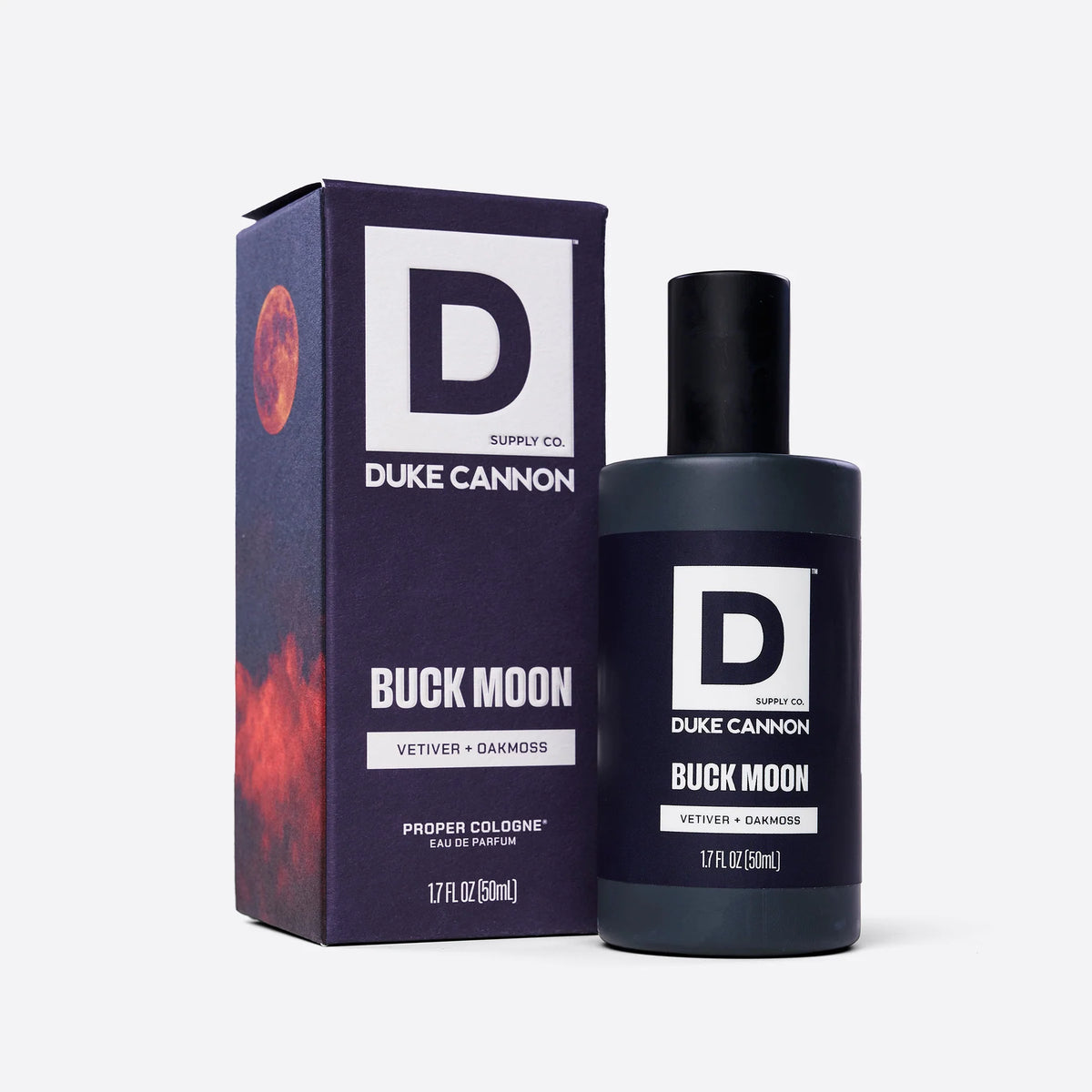 bottle of Buck Moon Proper Cologne next to its box