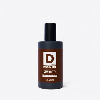 bottle of sawtooth cologne with a brown label shown on a white bckground