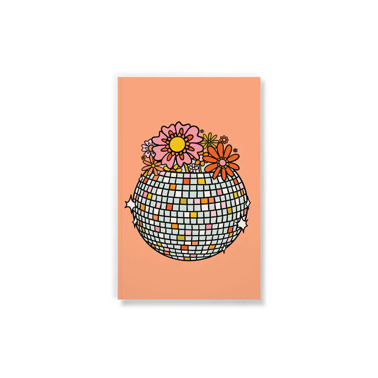 orange notebook with a graphic of a disco ball filled with flowers on it.