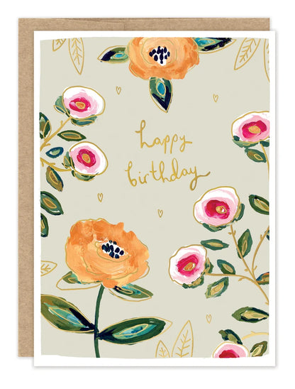 front of card featuring flowers and gold text