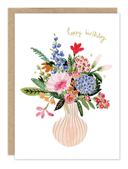 front of card featuring a vase of flowers and gold text