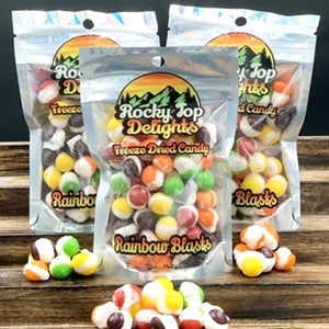 photo of three rainbow blasts packages and candies on counter 