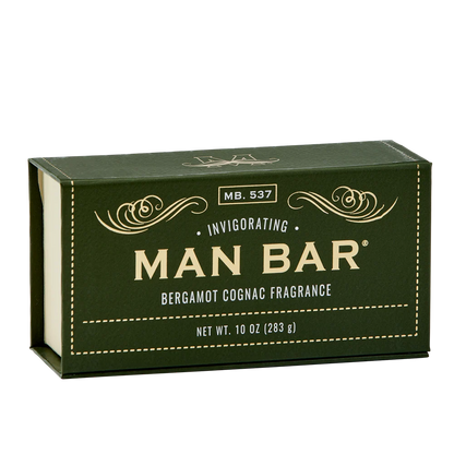 green box packaging of bergamot cognac invigorating man bar with gold lettering 