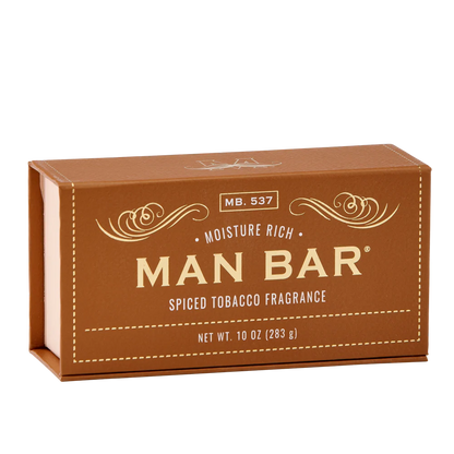 brown box packaging for spiced tobacco moisture rich man bar with gold lettering