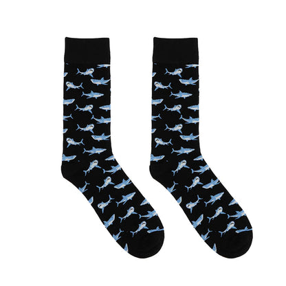 Black socks with blue shark pattern on a white background
