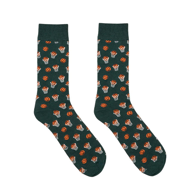 Green socks with a pattern of basketballs on a white background
