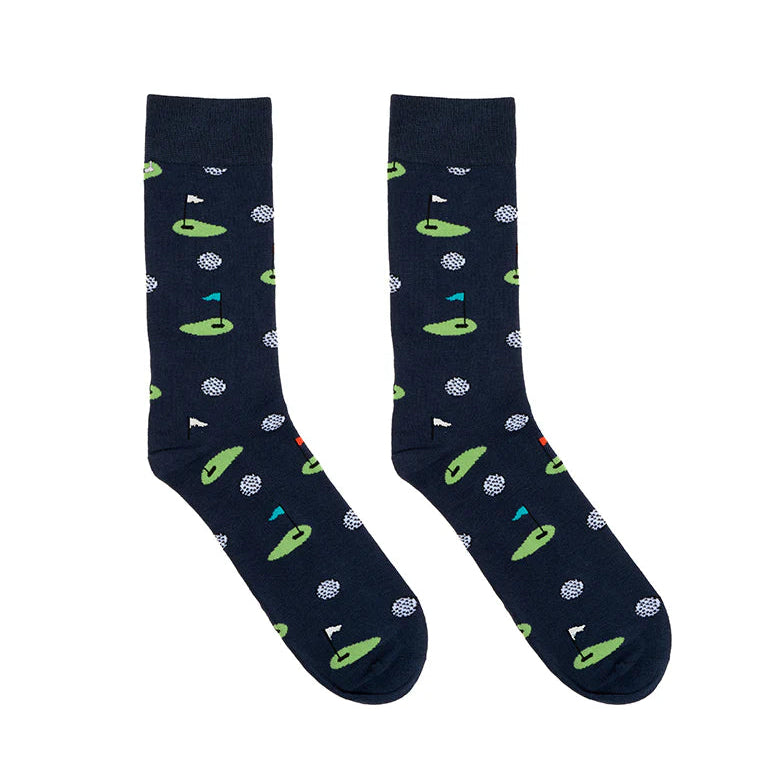Pair of navy socks with green gold themed pattern on a white background
