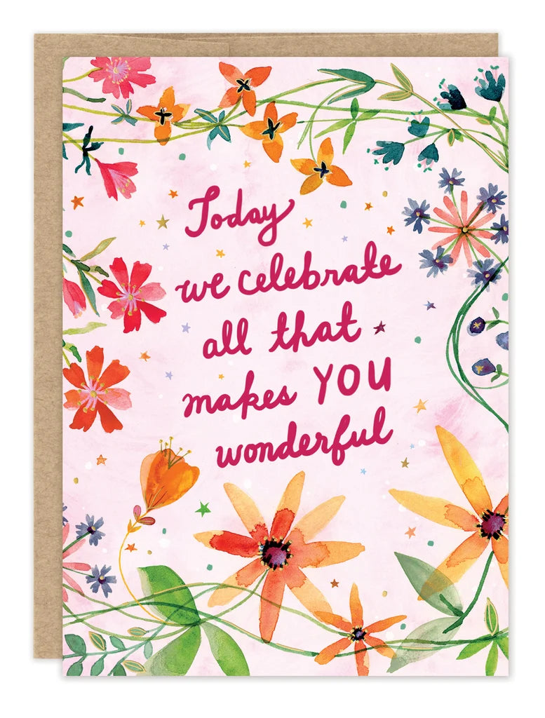 front of card featuring pink text and flowers