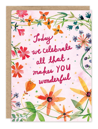 front of card featuring pink text and flowers