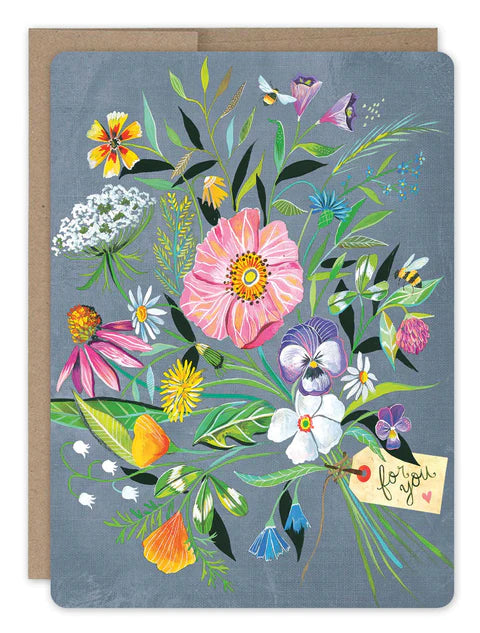 front of card is denim color with different flowers all over, text listed in the description, natural envelope behind it and displayed on a white background