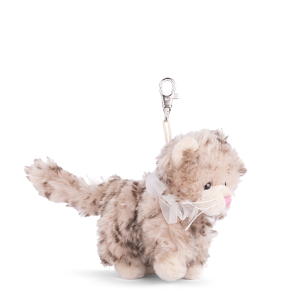 side view of beige Plush cat-shaped keychain with a bow on a white background