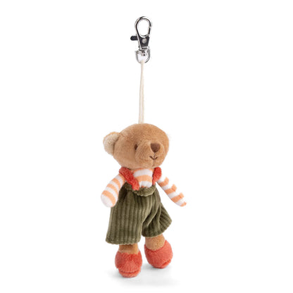 Stuffed teddy bear keychain with a striped sweater and green shorts on a white background