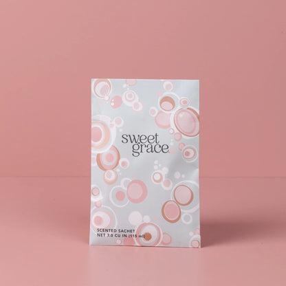 Sweet Grace Scented Sachet with modern bubble design of pinks, white, and grey