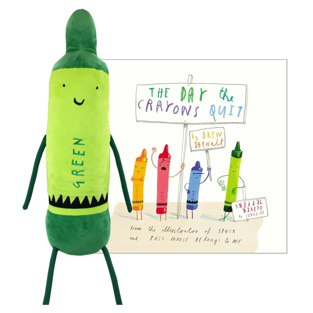 green crayon doll set next to the companion book.