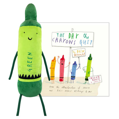 green crayon doll set next to the companion book.