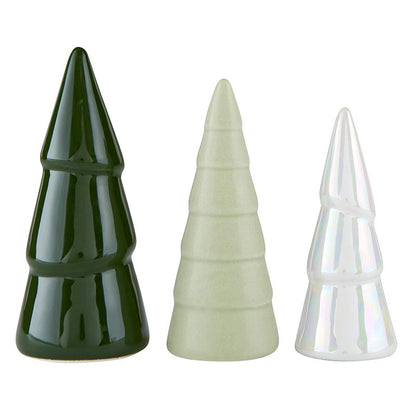 3 sizes and colors of ceramic trees in a row on a white background.