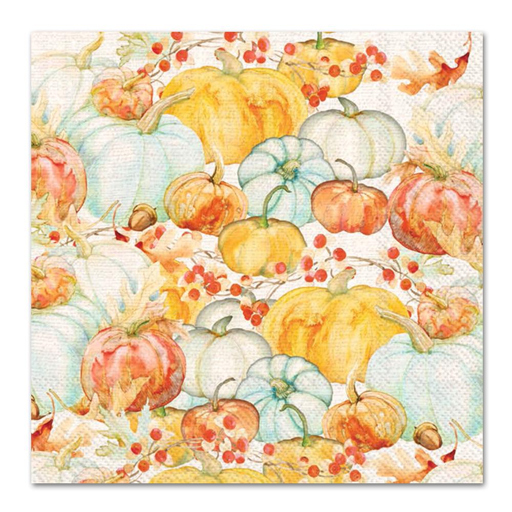 off-white paper napkin with all0over design of pumpkins in shades of orange, white, and light blue.