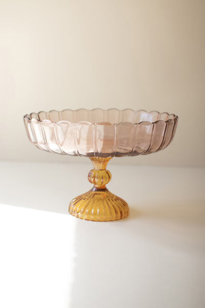 empty glass compote with pale purple bowl on yellow pedestal