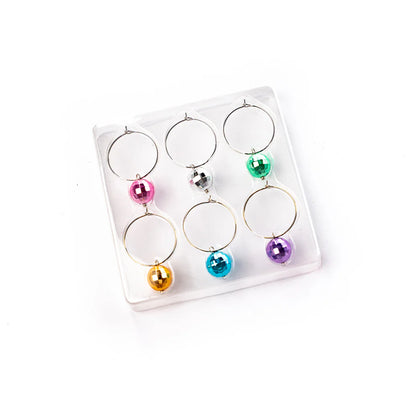 set of 6 disco ball drink markers, one each of pink, silver, green, orange, blue, and purple.