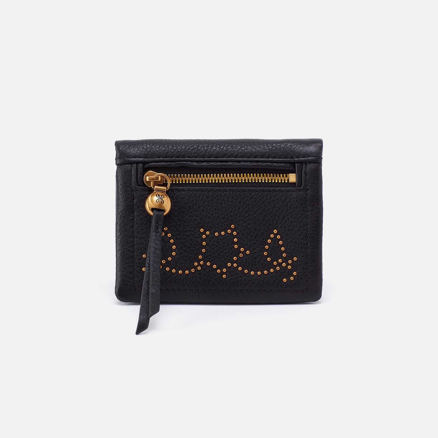 black lumen mini wallet with gold studs in floral design
