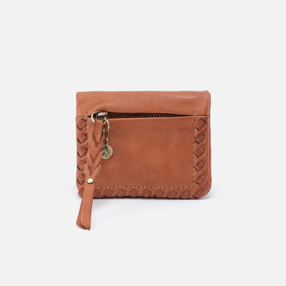Brown leather wallet with braided trim on a white background