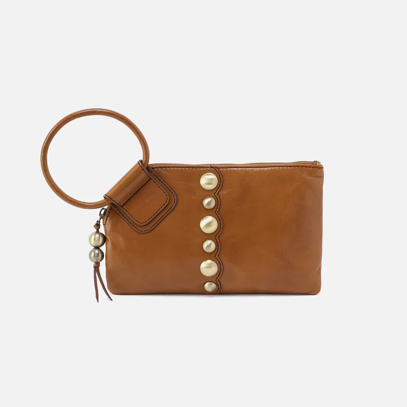 truffle sable wristlet with gold studs down the front.