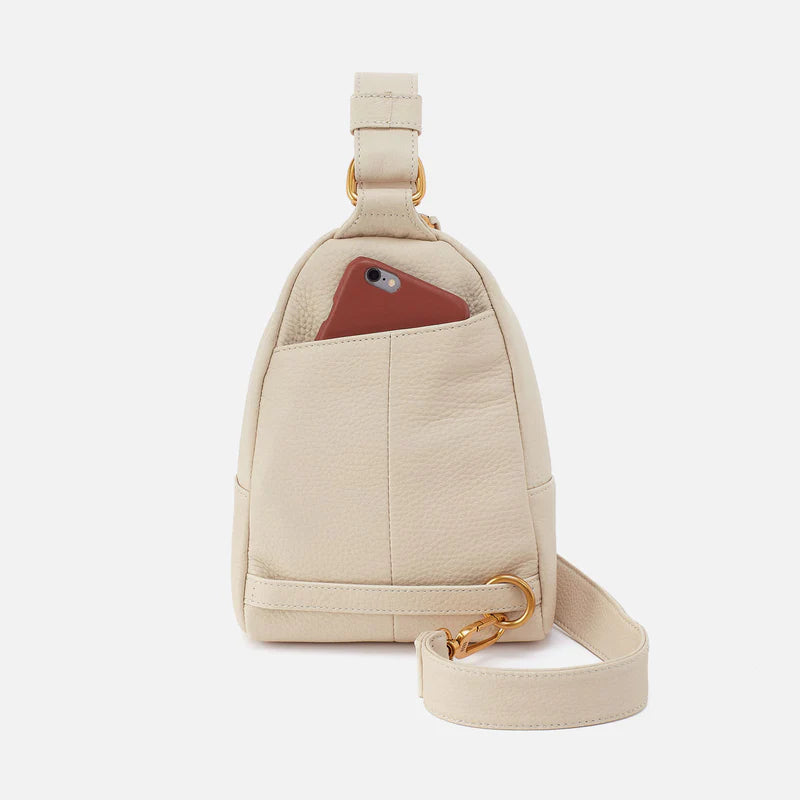 back view of birch fern sling bag with phone in pocket