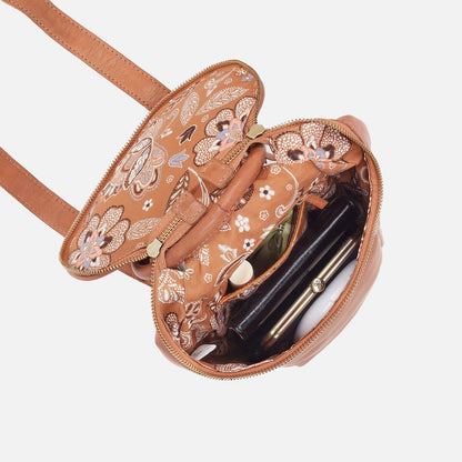 interior view of harvest wheat Sheila Sling Bag showing bag contents