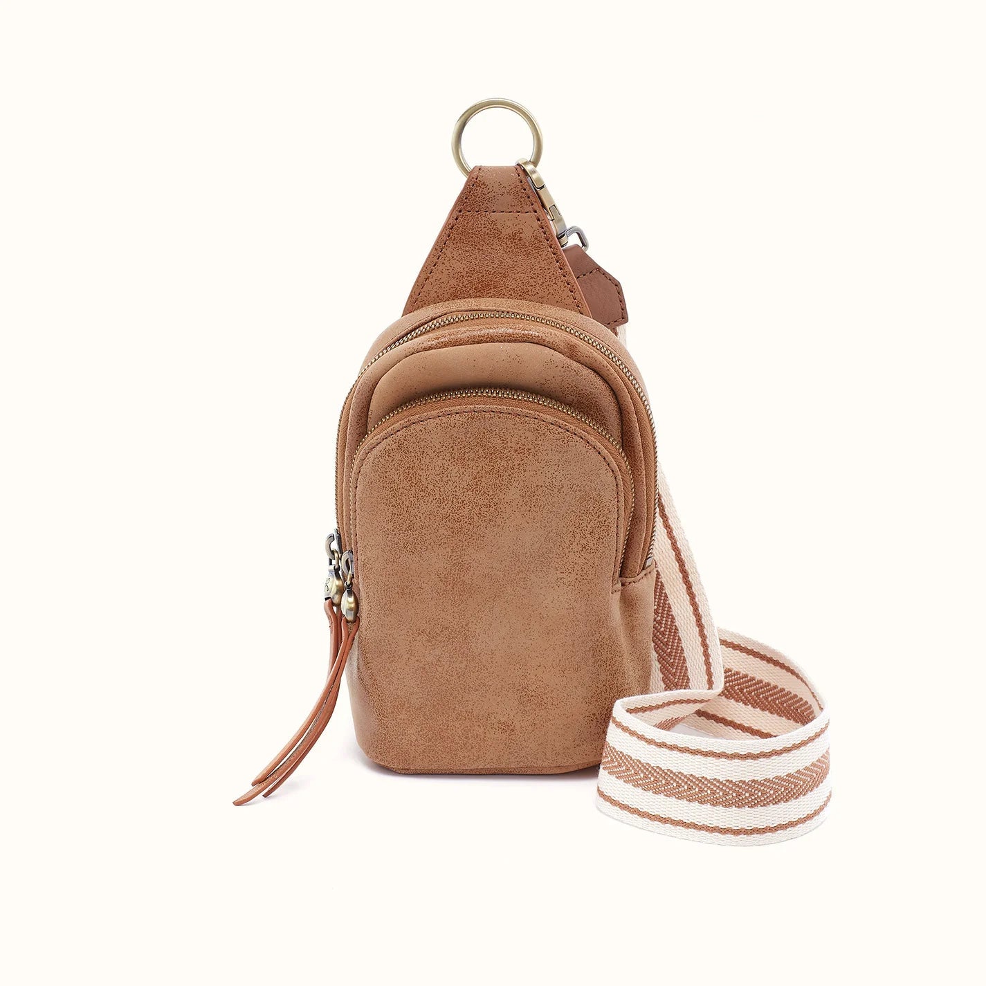 front view of the small fern sling in buffed leather whiskey