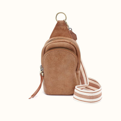front view of the small fern sling in buffed leather whiskey
