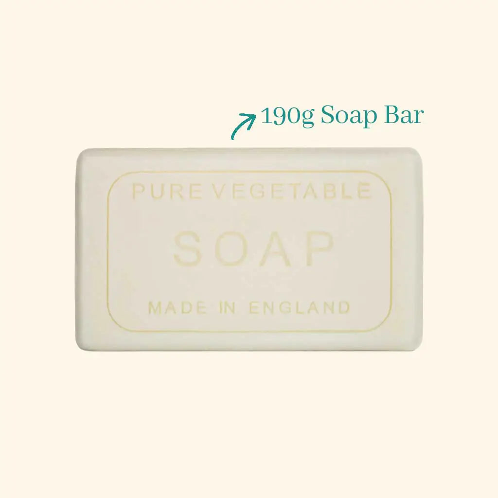 unwrapped 190g soap bar embossed with 'Pure Vegetable Soap Made in England' on a light beige background