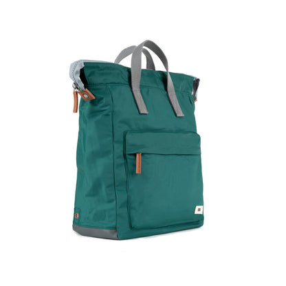 side view of teal bantry b backpack.