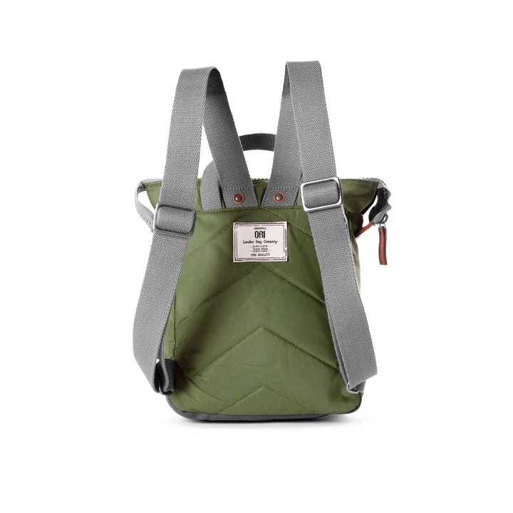 back view of green bantry b backpack showing shoulder straps.