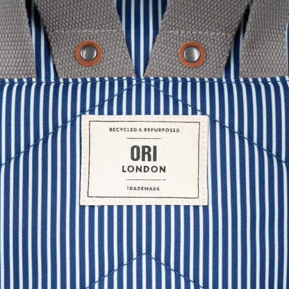 close-up of Ori London patch on back of canfield backpack.