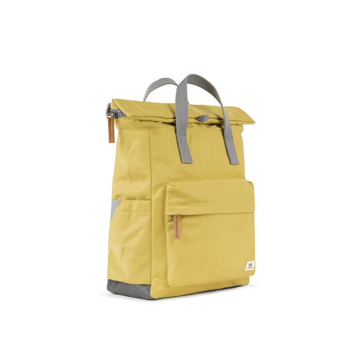 side view of yellow canfield b backpack.