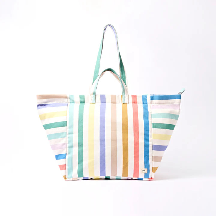Multicolored striped tote bag on a white background
