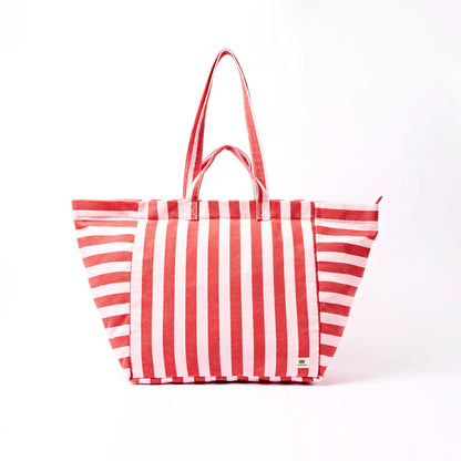 Red and pink striped tote bag on a white background