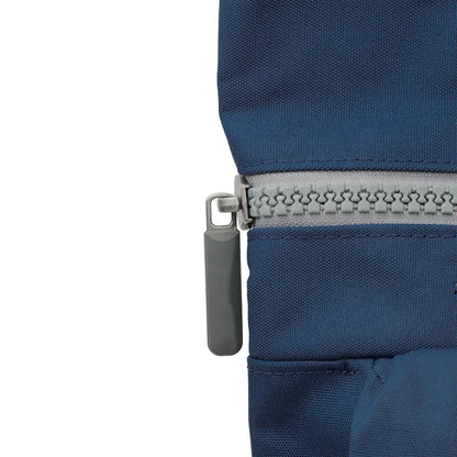 close-up of top zipper on Richmond backpack.