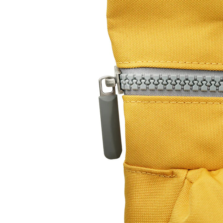 close-up of top zipper on Richmond backpack.