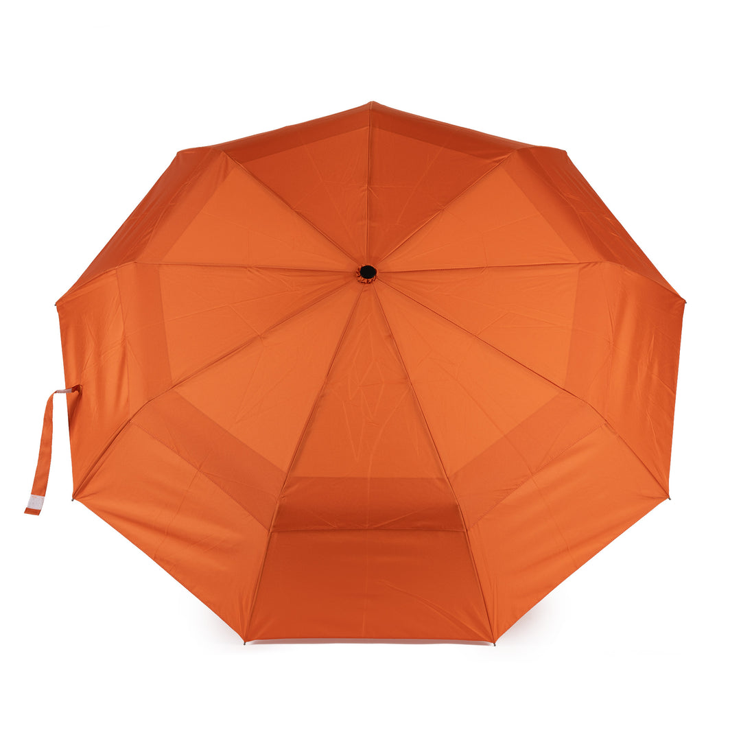open burnt orange umbrella shown on a white background