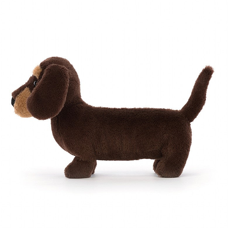 side view of Otto Sausage Dog Plush Toy displayed against a white background